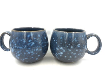 2 x Reactive Glaze Cuddly Stoneware Sphere mugs in Mottled denim blue.