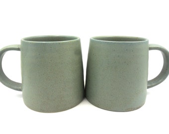 2 x Reactive Glaze Cuddly Brûlée Stoneware mugs in matt clay.