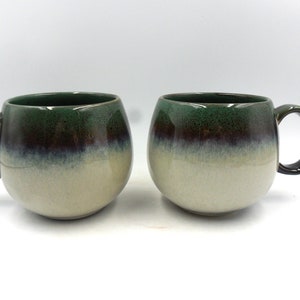 2 x Reactive Glaze Cuddly Stoneware sphere mugs in Dark green n misty.