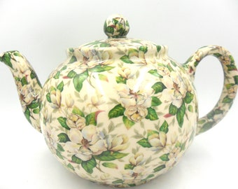 Magnolia chintz design 6 cup teapot made by Heron Cross Pottery