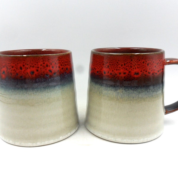 2 x Reactive Glaze Cuddly Brûlée Stoneware mugs in Red Garnet and Mist.