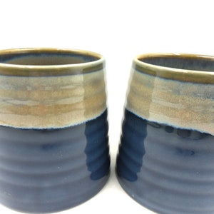Set of 2 x Reactive Glaze Cuddly Brûlée Stoneware mugs in Denim blue and seashore.