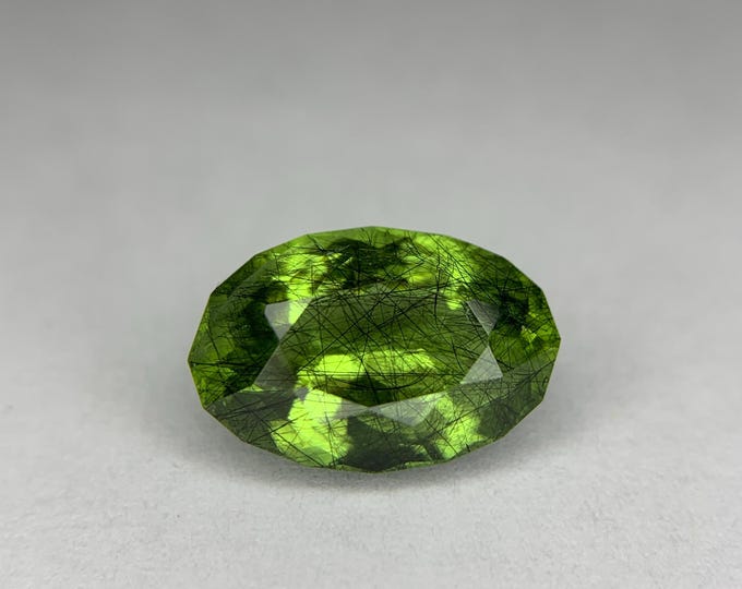 Natural Loose Peridot - Loose Peridot -2.9 Ct Oval Mixed-Cut Natural Peridot with Rare Ludwigite Inclusion – Unique Gem from Pakistan-