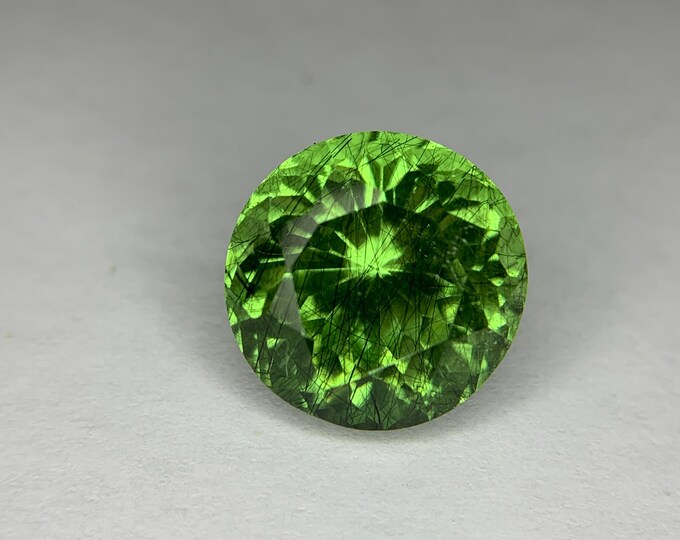 Natural Rare Ludwigite Inclusion Peridot. Natural Peridot . Round Brilliant Cut 6.73 Carat Peridot From World Finest Peridot Mine .