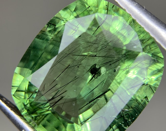 Natural Rare Ludwigite Peridot . AAA Grade  Rare Pyrite Crsytal WIth Ludwigite In Peridot . Natural Peridot. Gem Of SUn Loose Green Peridot.