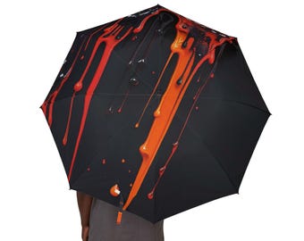 Ombrello semiautomatico pieghevole con schizzi di vernice arancione e rossa