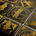 Moth Butterfly Bee Beetle Dragon Fly Gold Black Mysthical Greeting Card Print product logo