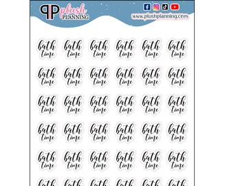 May include: Thirty-six white circle stickers with black text that reads "bath time" in a cursive font.