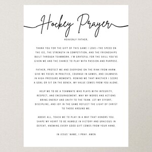 May include: A white print with the words "Hockey Prayer" in elegant script. The text includes a prayer for the game of hockey, expressing gratitude, seeking protection, and requesting guidance. The print is on a neutral background.
