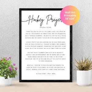 May include: Black framed wall art print with the text "Hockey Prayer" in a script font. The print includes a prayer for hockey players, with the dimensions 18"x24" in a pink and yellow circle.
