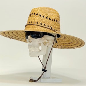 Indiana-Pescador, hand woven straw hat, ventilated, all natural, brim size about 5” in. The inside circumference about 23.1/4”inches,