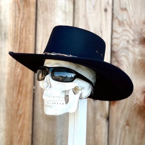 Black Felt Gallero Cowboy Hat, with an elastic sweat bandana for a comfort fit and incase a bit Big, Made in Mex. Rain Cover included!