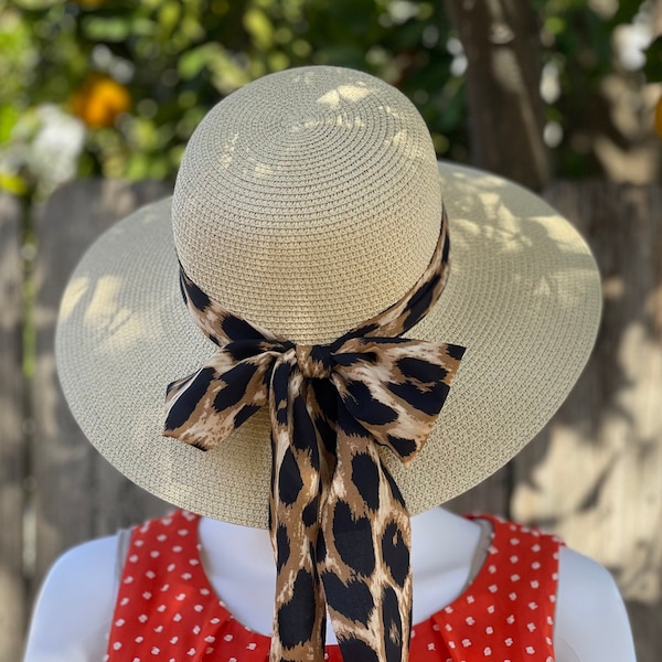 Light beige sun hat, animal print bandana with a bow on back, brim size 4” inches, the inside circumference about 23” inches