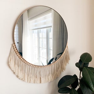 Large round wall mirror / gold edge / cotton fringe / macrame / wood beads