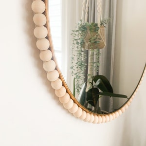 Large round wall mirror / gold edge / macrame / wood beads