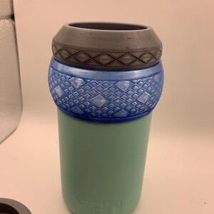 16oz Adapter  Style: Argyle Color: Translucent Blue. Shown with Izer Designs 12-16 Extension gasket/lid, Argyle model in Silver color. Combination shown w/12oz yeti accommodates 12oz Slim cans. yeti and lid not included. See other listing to purchase lid shown.