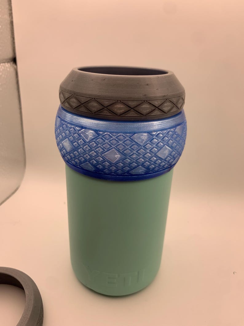 16oz Adapter  Style: Argyle Color: Translucent Blue. Shown with Izer Designs 12-16 Extension gasket/lid, Argyle model in Silver color. Combination shown w/12oz yeti accommodates 12oz Slim cans. yeti and lid not included. See other listing to purchase lid shown.