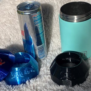 photo showing both version Quick Turn models; flexible TPU and PETG hard plastic. yeti and beverage not included