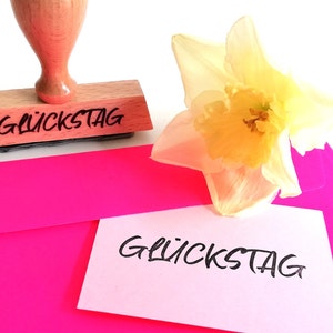 Stempel Glückstag, Statement, Typo