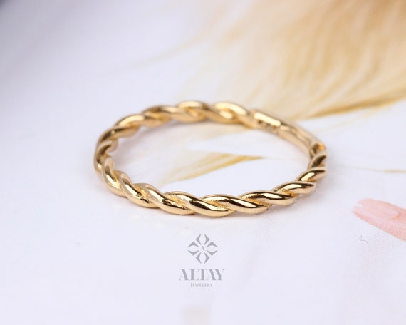 Solid gold twist on sale ring
