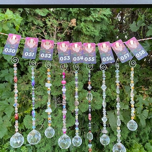 Hand-Crafted Hanging Rainbow Prism Suncatchers | Brighten Up Any Room with sunflowers, amethyst, yellow citrine and crystals.