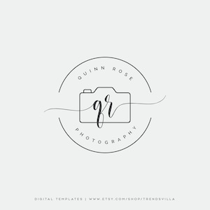 May include: Black and white logo design for a photography business called Quinn Rose Photography. The logo features a stylized camera with the initials "QR" inside.