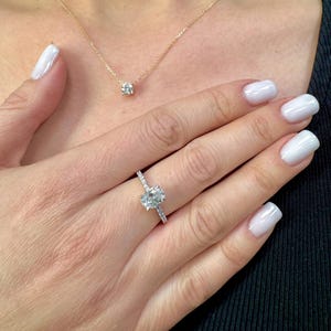 1.5 Carat Oval Lab Grown Diamond Engagement Ring: 14k Gold Hidden Halo Pave Setting