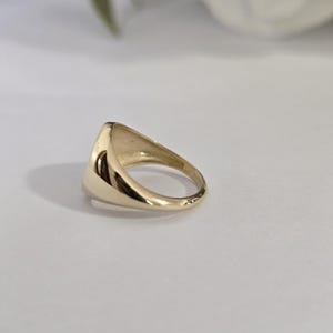 May include: A rustic wooden sign with the text "Welcome to our home" in white lettering. The sign has a distressed finish and a simple, inviting design, ideal for entryway decor.