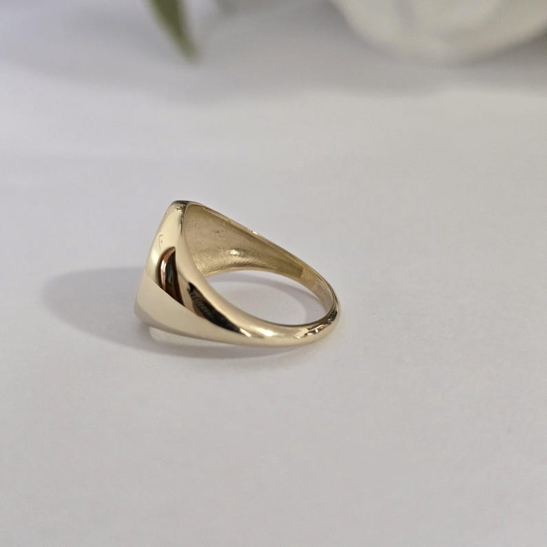 May include: A rustic wooden sign with the text "Welcome to our home" in white lettering. The sign has a distressed finish and a simple, inviting design, ideal for entryway decor.