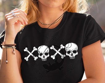 May include: Black t-shirt with a white graphic of two skulls with crossbones and a lizard silhouette. The text "Crazy Lizards" is written around the graphic.