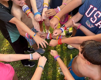 Pulseiras de hóquei ajustáveis com cadarço
