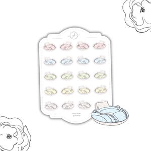 May include: A sheet of colorful pool float stickers in various pastel colors, including pink, blue, and yellow. The stickers are arranged on a white background with a single, larger sticker of a blue pool float. Text at the bottom reads "Pool Float (colorful)".