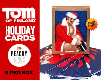 May include: A set of eight holiday greeting cards featuring a man dressed as Santa Claus. The cards are in a brown box with the text "8 CARDS PER BOX". The cards are blue with a red and white Santa Claus design. The text "TOM OF FINLAND® HOLIDAY CARDS" is on the red background.