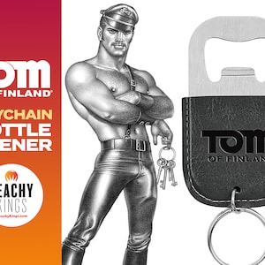 May include: A black leather keychain bottle opener with a silver bottle opener and a Tom of Finland logo. The keychain features a silver ring and a black leather loop.