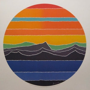 May include: An abstract print in a circular format, displaying horizontal bands of red, orange, yellow, and blue. Below, stylized mountain ranges in green, grey, and black sit above a blue base. The artwork is signed.