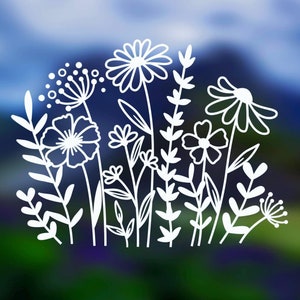 May include: White silhouette of a cluster of wildflowers with delicate stems and leaves against a blurred blue and green background.