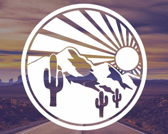 May include: A white silhouette of a desert landscape with a sun rising over mountains and cacti. The image is in a circle with a white outline.