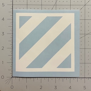 May include: A light blue square with a white diagonal stripe pattern.