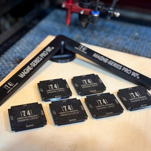 May include: Black Magne-Series Pro 90° angle and Magne-Lock squares. The angle has the text "MAGNE-SERIES PRO 90°" and "174 Creative Designs". The squares have the text "174 Creative Designs Magne-Lock" and measurements.