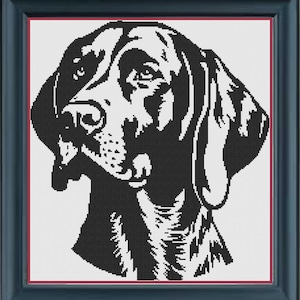 May include: Black and white illustration of a dog's head. The dog has floppy ears and a long snout.