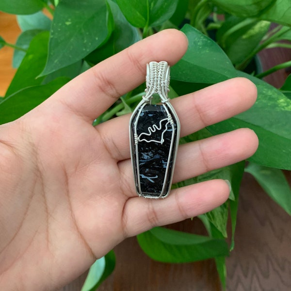 Black Palm Root Agate coffin wrapped in sterling silver wire pendant