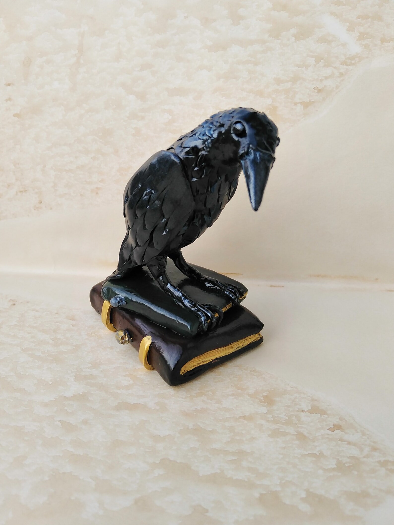 resin raven statue