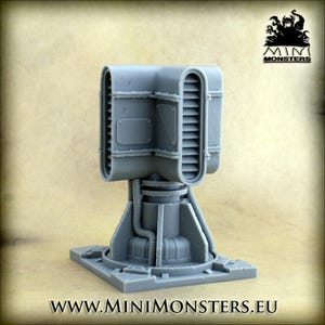 May include: A grey miniature model with a futuristic design, featuring a rectangular top with vertical vents and a cylindrical base. It is mounted on a square base with detailed paneling. The website address www.minimonsters.eu is printed at the bottom.
