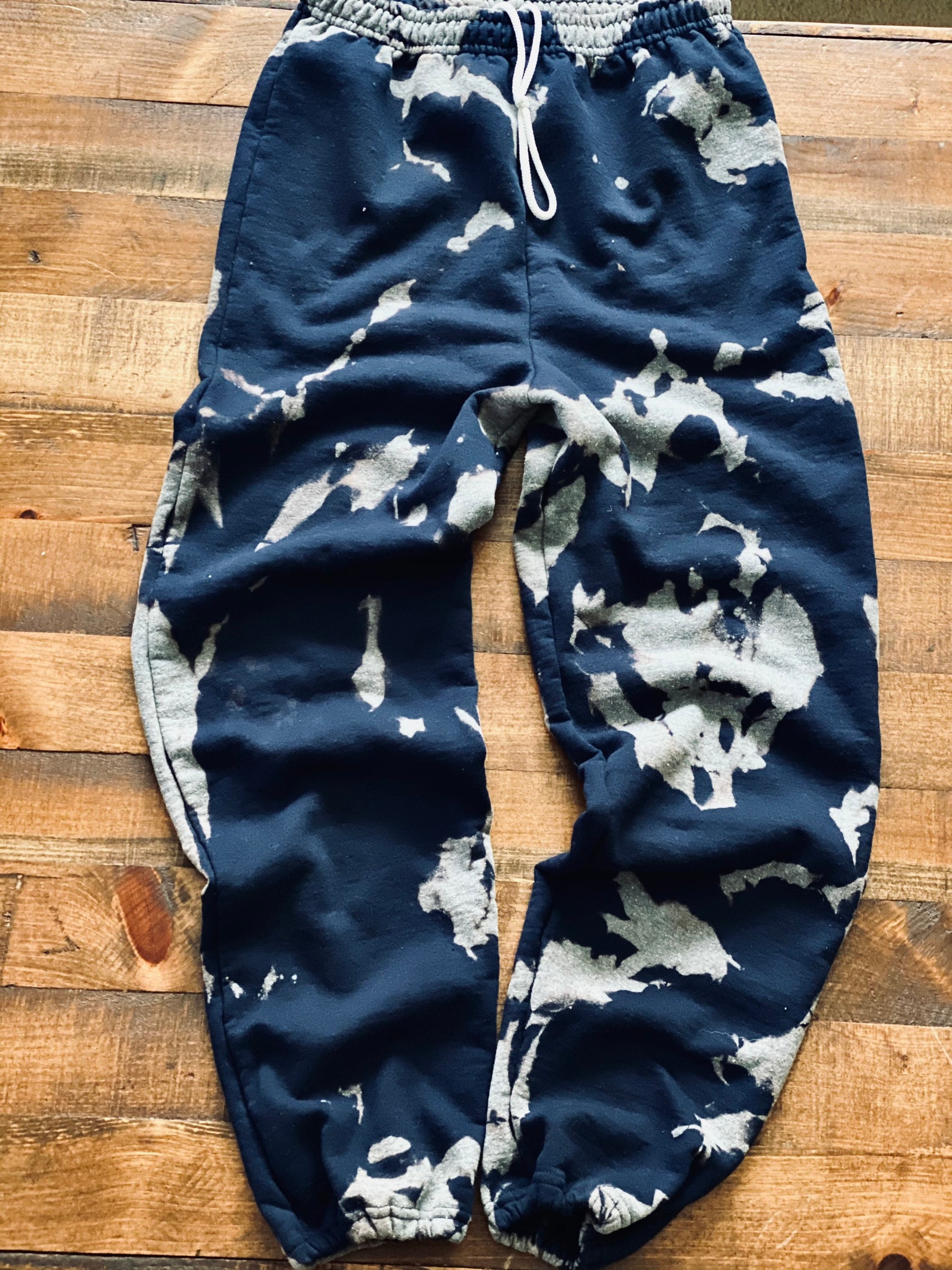 navy joggers with white stripe