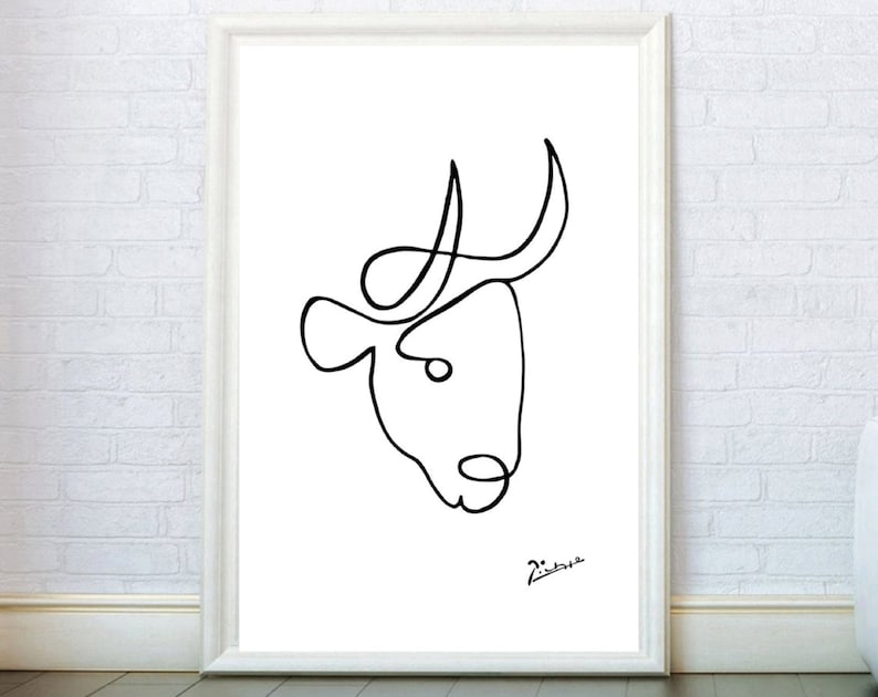 May include: A black and white line drawing of a bull's head. The drawing is simple and elegant, with a single line used to create the entire image. The bull's horns are prominent, and its eyes are wide open. The signature "Picasso" is visible at the bottom right corner.