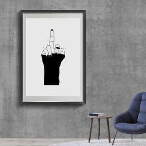 May include: Black and white line art print of a hand giving the middle finger, framed in a black frame.
