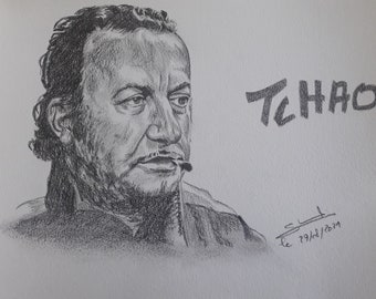 Portrait de Coluche réalisé aux crayons