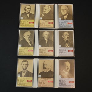 May include: A set of ten trading cards featuring black and white portraits of American presidents. Each card has a red, white, and blue border and includes the president's name, years in office, and a brief biography. The cards are from the Little Golden Books series.