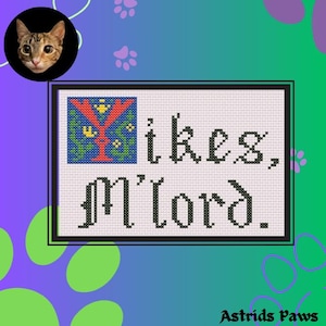 Pode incluir: Padrão de ponto cruz com uma ilustração medieval colorida de uma árvore com o texto "Likes, M'lord." O padrão está sobre um fundo branco.
