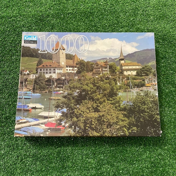 ユーログラフィックス「飛行機でスイスへ行こう」1000ピースパズル - ヴィンテージ旅行ポスター